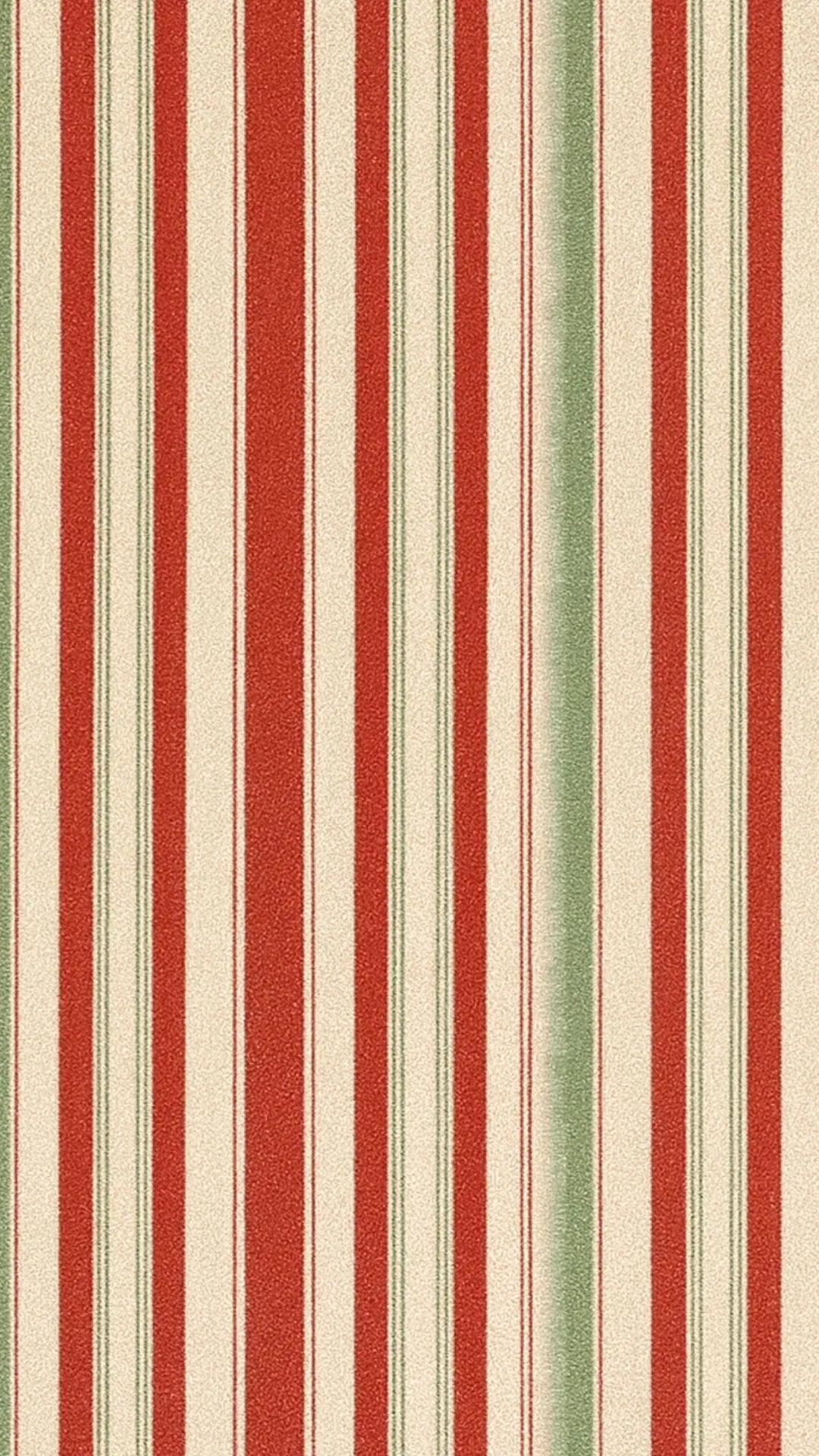 Classic Christmas rug with bold vertical stripes in holiday colors