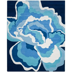 Coastal Drift hand-tufted rug by Mannat Rugs featuring an abstract floral design in layered blue and white shades