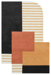 Modern geometric colorblock area rug in black, rust, and gold.