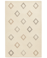 Cream hand-tufted wool diamond rug with minimalist geometric pattern.