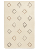 Cream hand-tufted wool diamond rug with minimalist geometric pattern.