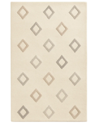 Cream hand-tufted wool diamond rug with minimalist geometric pattern.