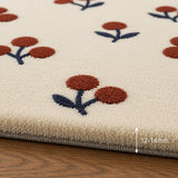 Cream red fruit wool rug