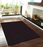 Solid dark brown wool rug for rustic and modern interiors