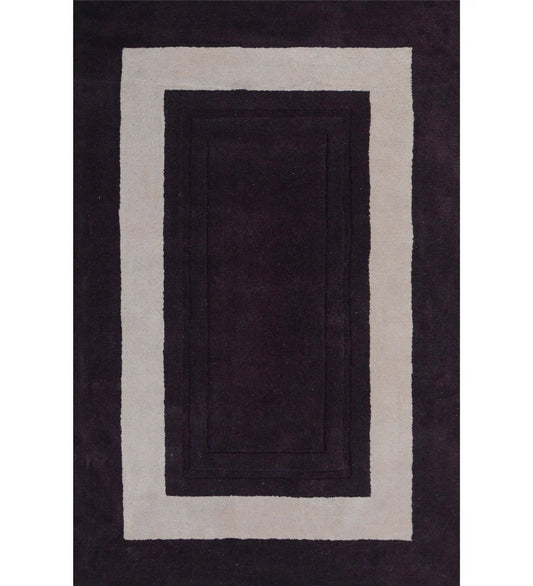 Plum and ivory hand-tufted wool rug with geometric border design