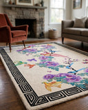 Decorative rug with floral and bird pattern in a living room setting
