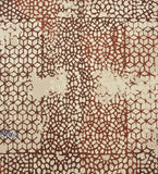 Distressed mosaic patterned luxury rug in beige and rust tones with an abstract, handwoven design