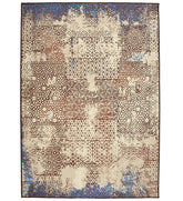 Distressed Mosaic Rug with vintage-inspired pattern.