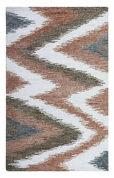 Hand-tufted chevron wool rug in brown and grey zigzag design.