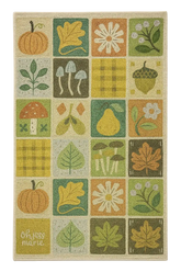Machine washable fall rug with pumpkins, acorns, and autumn leaves.