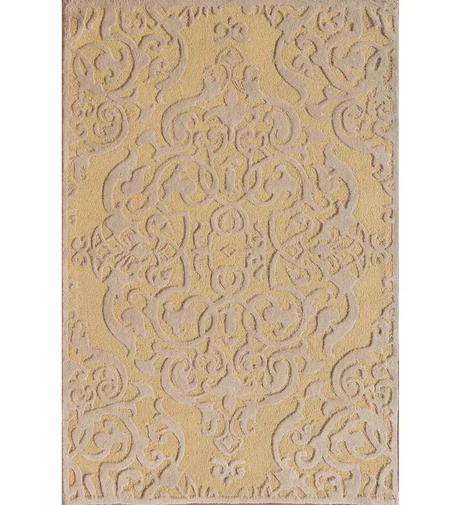 Gold hand-tufted wool rug with embossed damask pattern