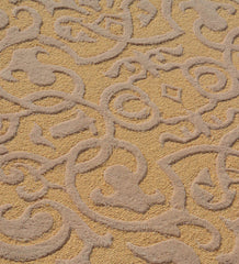 Ornamental embossed wool rug in gold tones for formal interiors