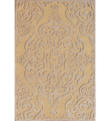 Gold hand-tufted wool rug with embossed damask pattern