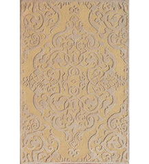 Gold hand-tufted wool rug with embossed damask pattern