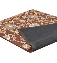 Brown hand-tufted wool rug with gold and blue floral design