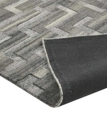 Modern hand-tufted grey rug with architectural geometric design