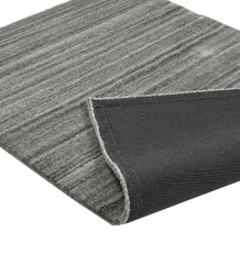 Handcrafted grey rug with linear textured stripe pattern