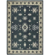 Gray tribal medallion rug with border design.
