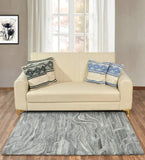 Modern grey rug featuring flowing wave-like textured pattern