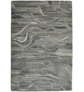 Grey wave abstract hand-tufted wool rug with stone-inspired design