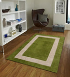 Minimalist bordered rug in green and ivory modern design