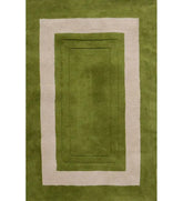 Green hand-tufted wool rug with ivory rectangular border