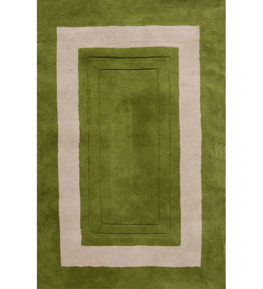 Green hand-tufted wool rug with ivory rectangular border