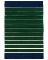 Hand-tufted wool novelty rug with green and blue striped design.
