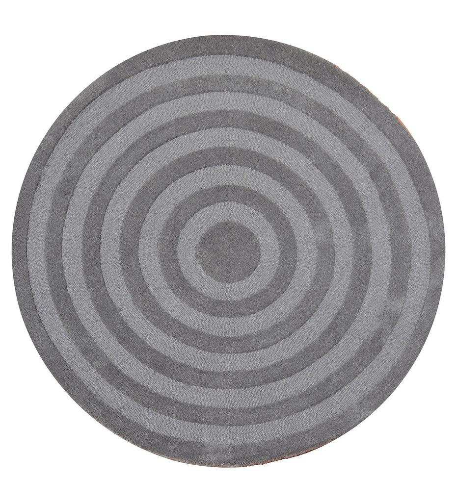 Round grey hand-tufted solid wool rug with concentric circle design for luxury home décor
