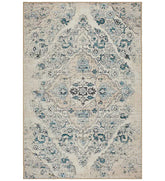 Ivory distressed Persian design rug with vintage-inspired detailing.
