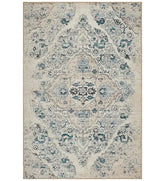 Ivory distressed Persian design rug with vintage-inspired detailing.