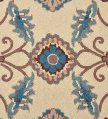 Handcrafted Persian-inspired rug with ivory base and blue accents