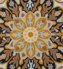 Luxury wool rug featuring ivory, gold, pink, and navy details