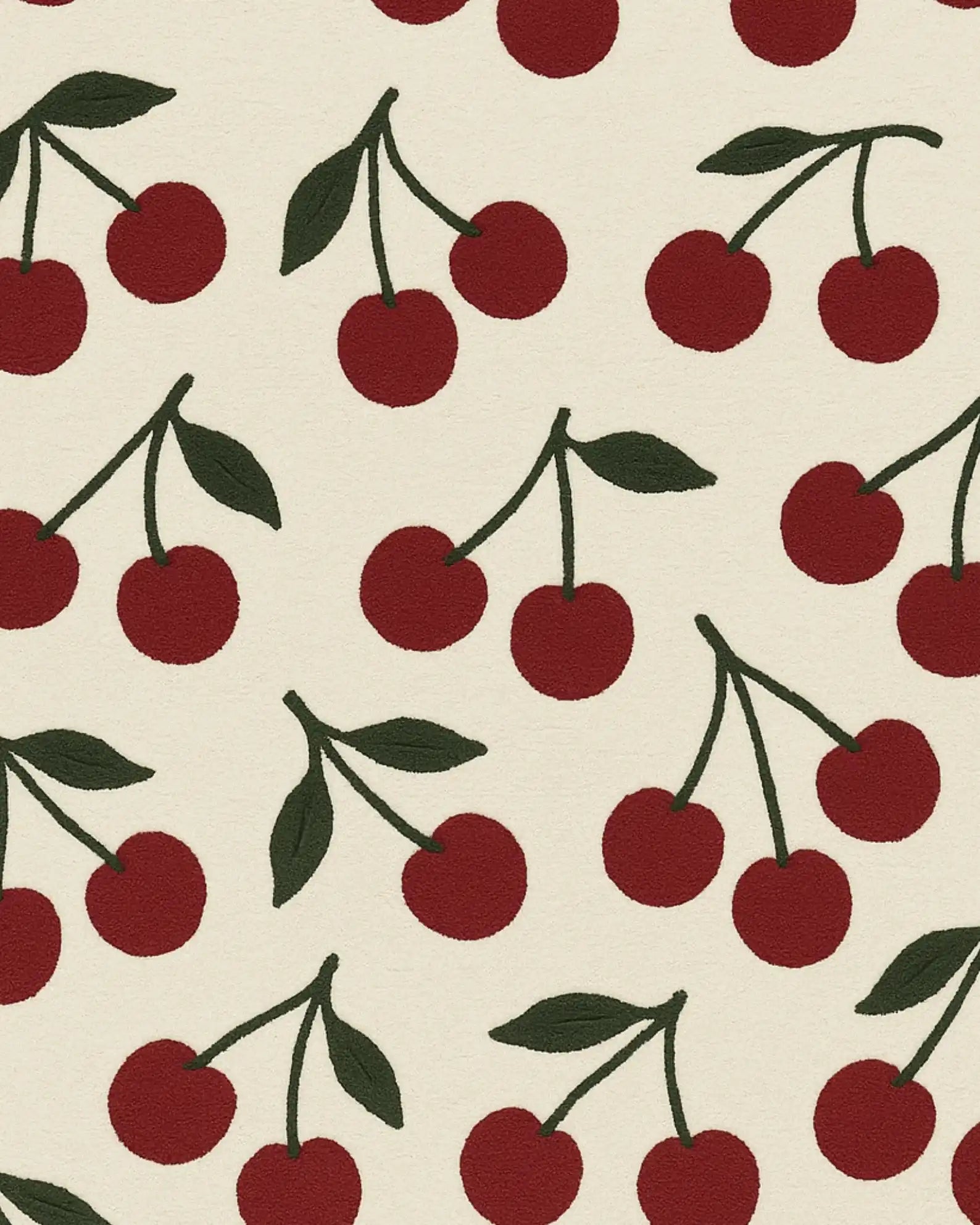 Handcrafted wool cherry rug for stylish and playful home interiors.