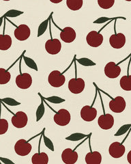 Handcrafted wool cherry rug for stylish and playful home interiors.