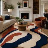 Living room with a colorful rug, sofa, coffee table, and fireplace.