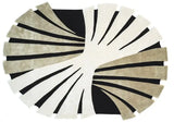 Modern abstract oval wool rug in beige and black tones.