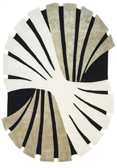 Luxury beige, black, and ivory sculptural oval hand-tufted wool rug.