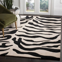 Modern hand-tufted zebra print rug for luxury interiors.