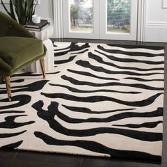 Modern hand-tufted zebra print rug for luxury interiors.