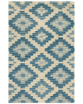 Blue and ivory diamond rug – hand-tufted wool geometric pattern.
