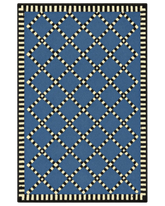 Blue and ivory diamond lattice rug – modern hand-tufted wool.