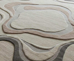 Luxury woollen hand-tufted rug with abstract layered beige, grey, and brown patterns by Mannat Rugs