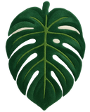 Hand-tufted tropical green monstera rug in luxury wool.
