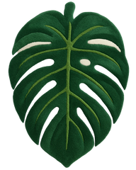 Hand-tufted tropical green monstera rug in luxury wool.