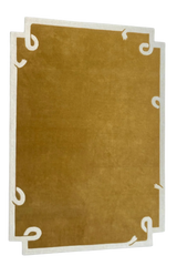 Hand-tufted wool rug in warm camel tone for modern living room.