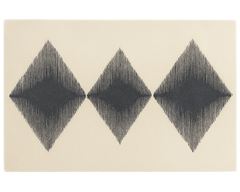Hand-tufted wool rug with modern black and cream diamond pattern.