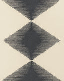 Minimalist geometric wool rug – cream and charcoal contrast.