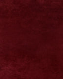 Minimalist cherry red rug handcrafted from premium wool.