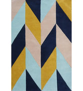Geometric patterned hand tufted rug with blue, yellow, and pink colors.